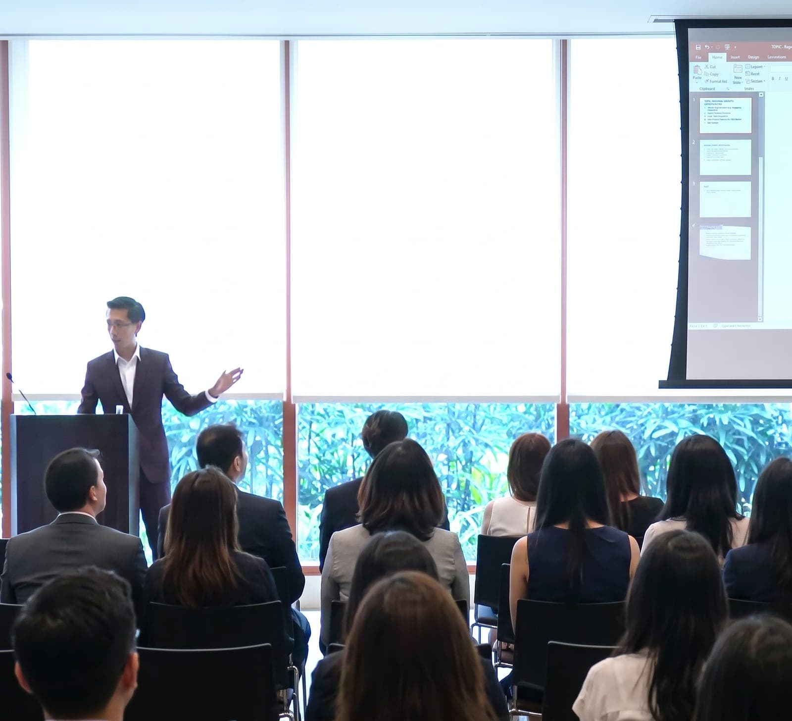 Karl leading a Power BI training session for a seated business audience